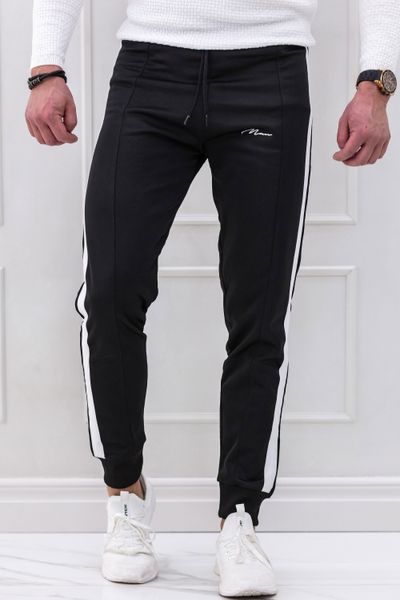 Black sweatpants with white stripes