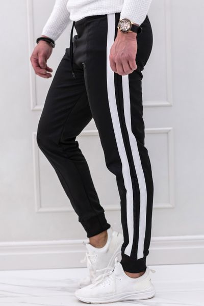 Black sweatpants with white stripes