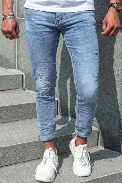 Light blue jeans with stone wash and distressed finish L32 JERONE Light blue jeans with stone wash and distressed finish L32 JERONE