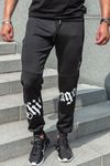 Black smooth-surface sweatpants with print