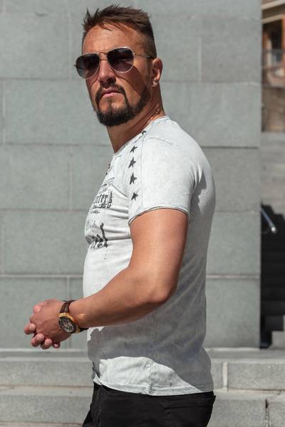 White washed T-shirt with RUSTY NEAL print